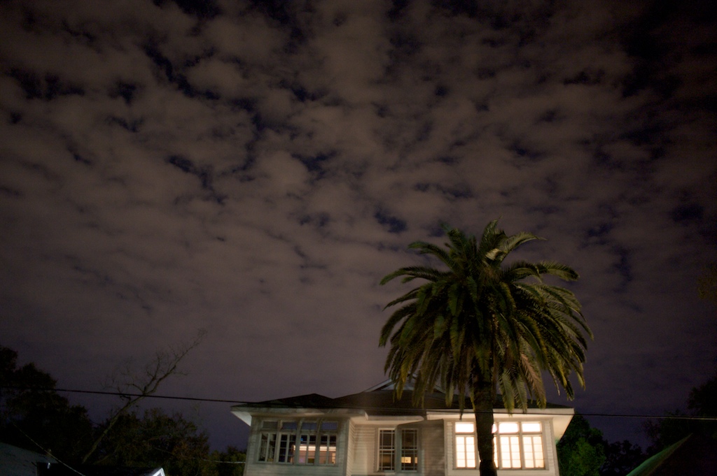 Clouds line the night sky above Dauphin Street in Mobile, Ala., Sunday night, Dec. 6, 2009.