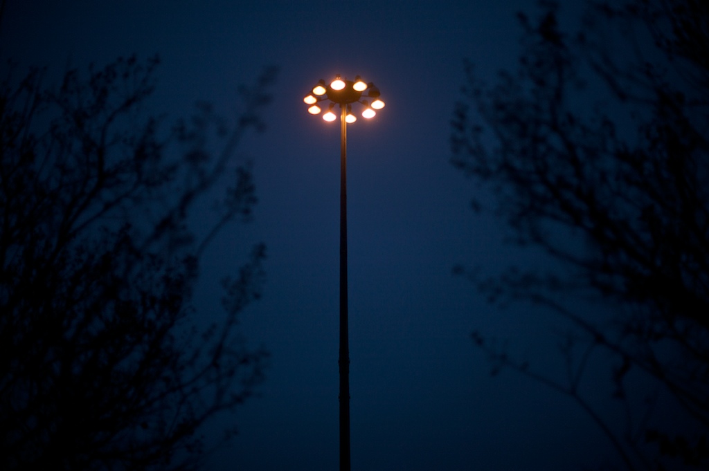 A light rises above an interchange of roads in Spanish Fort, Ala., Saturday, Dec. 12, 2009.