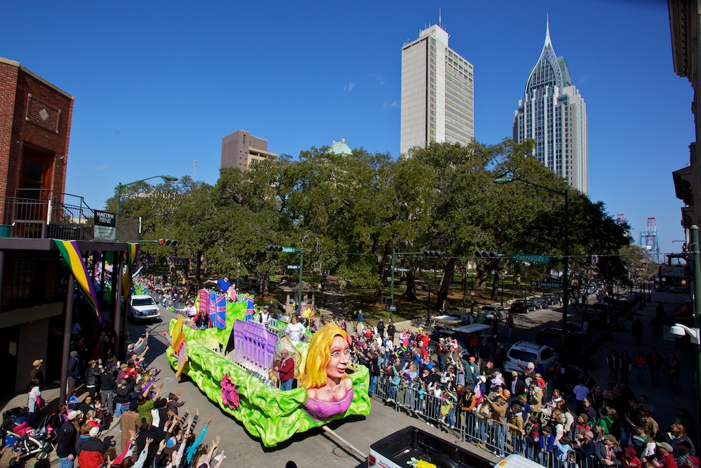 A Mardi Gras parade rolls along Conception Street in downtown Mobile, Ala., Saturday, Feb. 13, 2010.