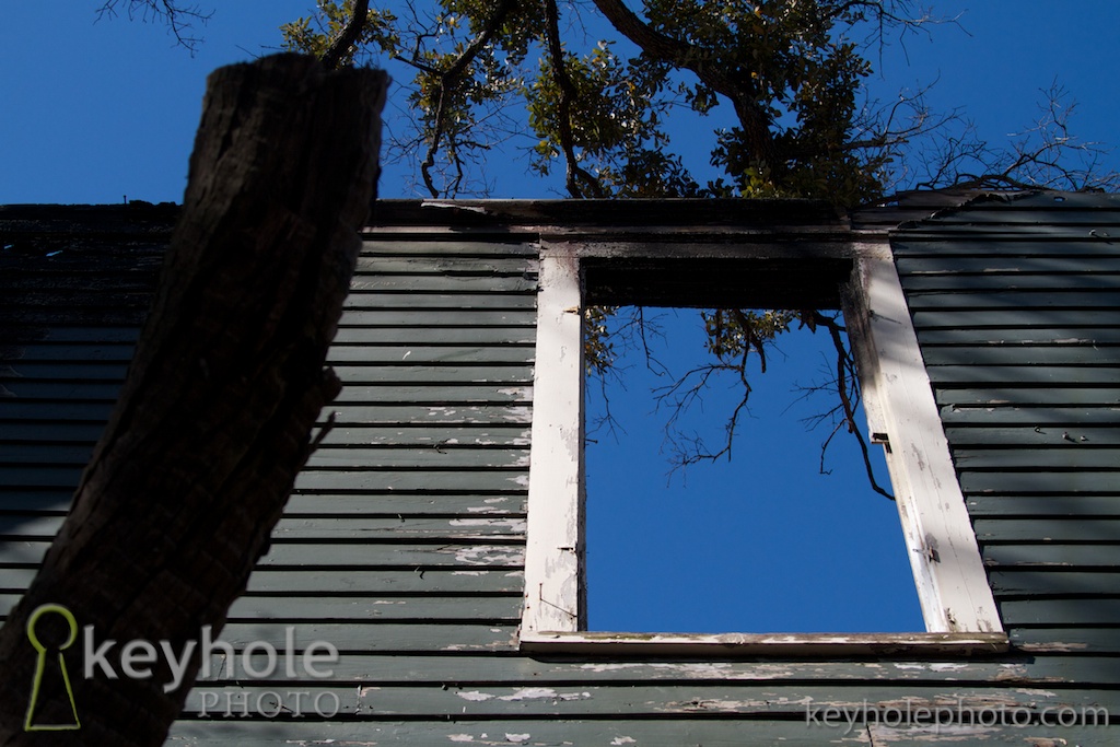 A house damaged by fire still stands at the corner of Old Shell Road and Michael Donald in Mobile, Ala., Monday, March 15, 2010.