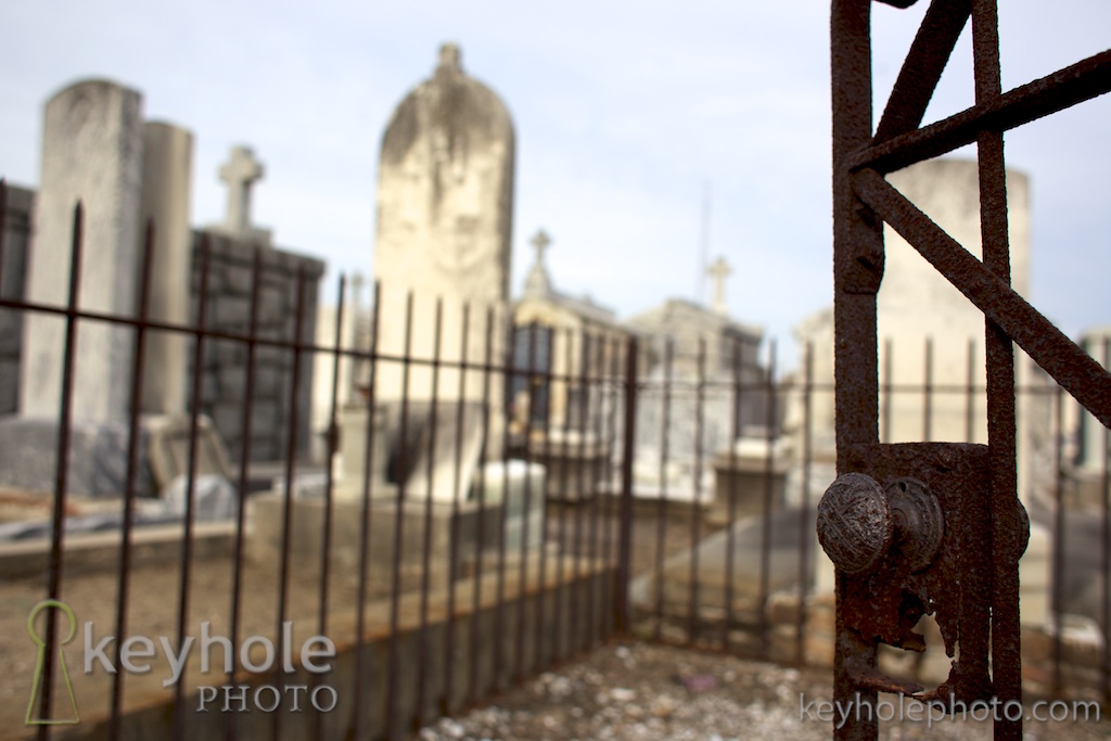 A rusted gate and its doorknob invite visitors to the Greenwood Cemetery in New Orleans, La., Friday, March 5, 2010.