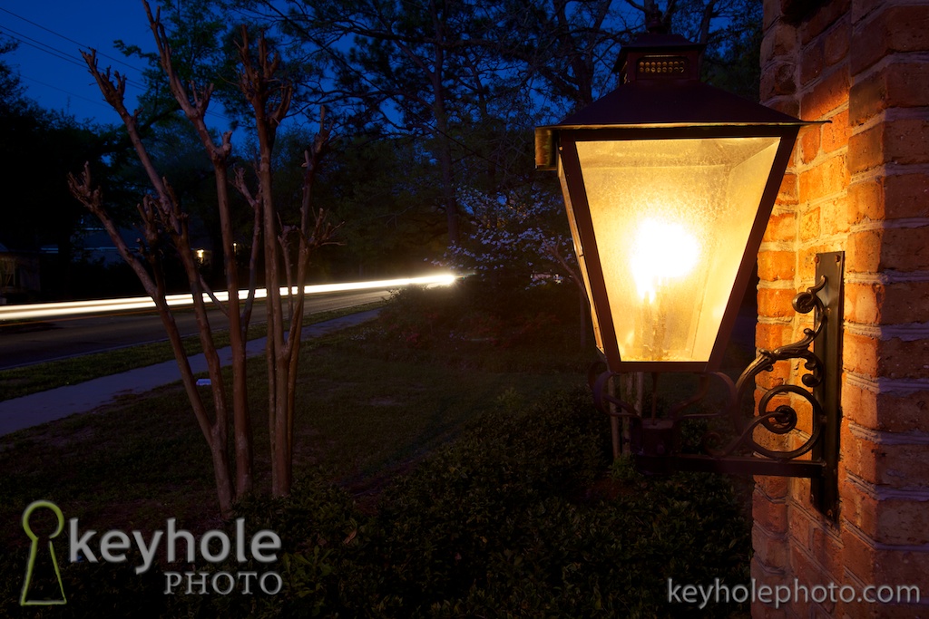 Cars drive by a gaslight on Old Shell Road and Schwaemmle in Mobile, Ala., Monday evening, April 6, 2010.