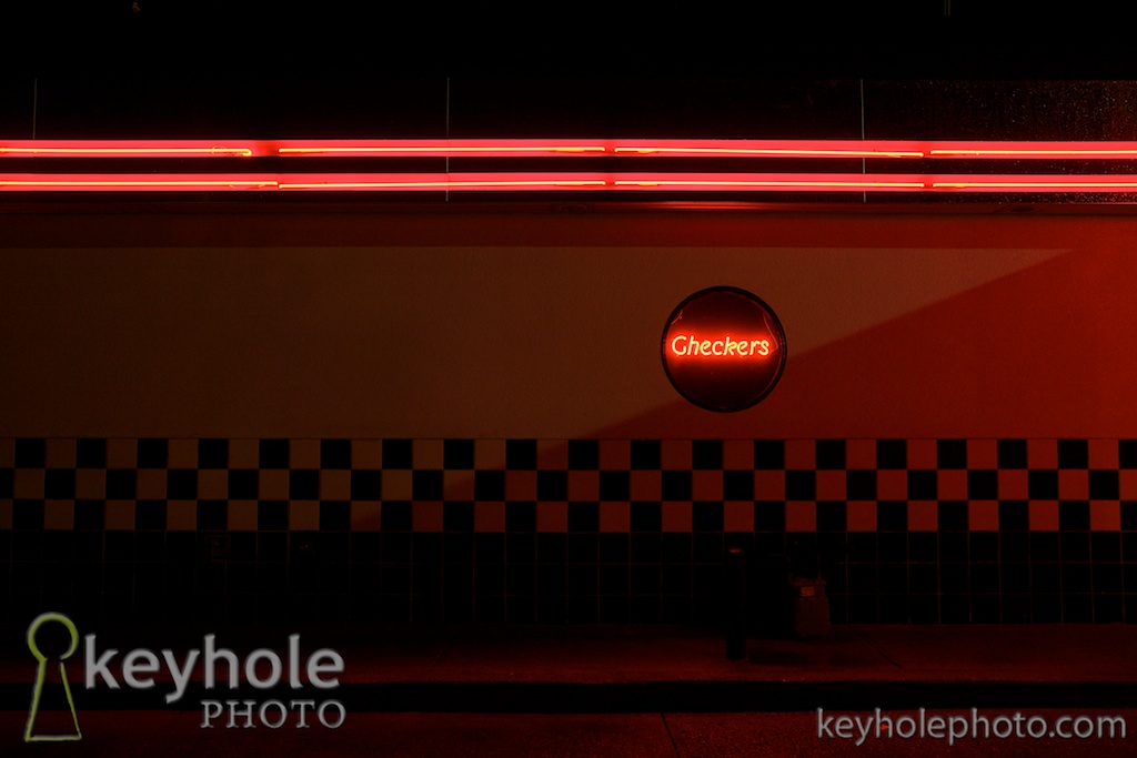 Checkers neon sign at night