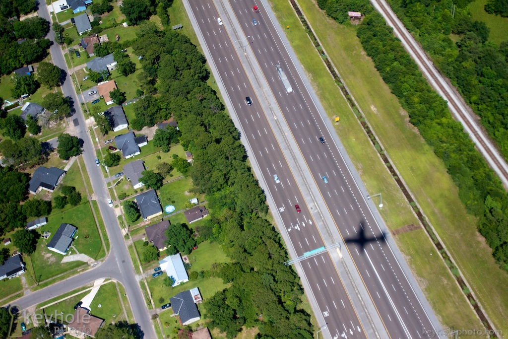 Airplane shadow on freeway