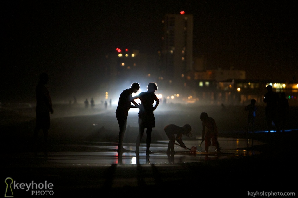 Beachgoers Search for Crabs