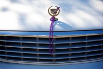 Beads hang on a hood ornament on Fat Tuesday in Mobile, Ala., February 16, 2010. Mobile, Ala., boasts of having the nation's oldest Mardi Gras celebration.