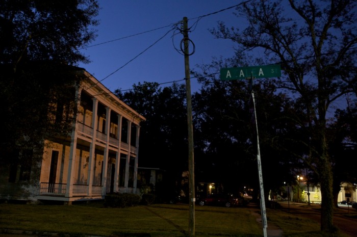 Letters on the Azalea Street sign are faded in Mobile, Ala.