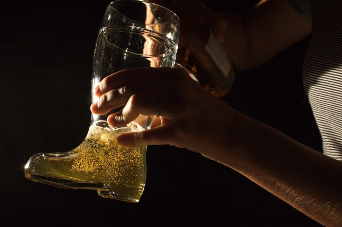 A beer boot is filled with beer