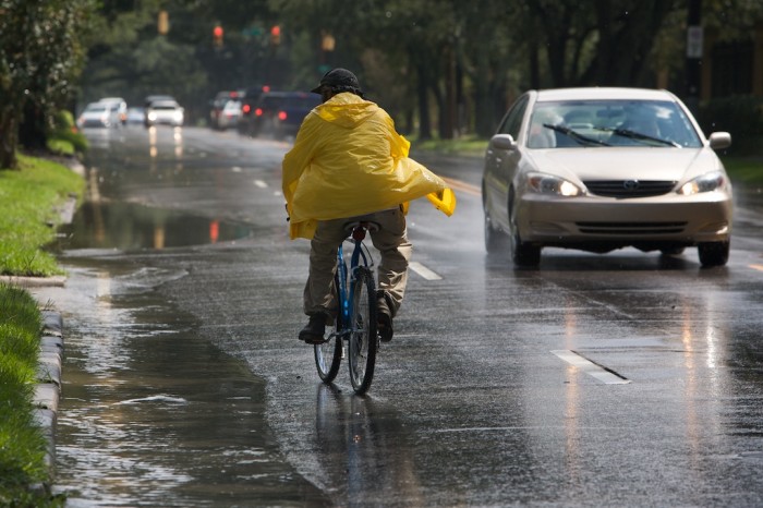 A man rides his bike down Dauphin Street in Mobile, Ala., Thursday, Sept. 17, 2009.