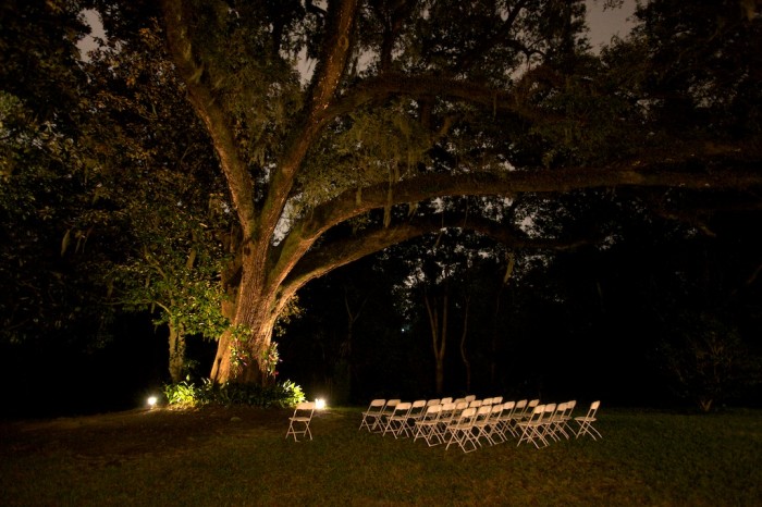 A Live Oak towers over chairs still standing after a wedding ceremony at Magnolia Manor in Mobile, Ala., Friday, Oct. 30, 2009.