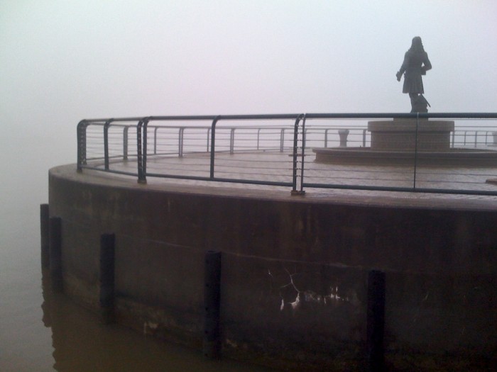 A statue of Pierre Le Moyne d'Iberville stands above the Mobile River in downtown, Mobile, Ala., on a foggy Sunday morning, Dec. 13, 2009.