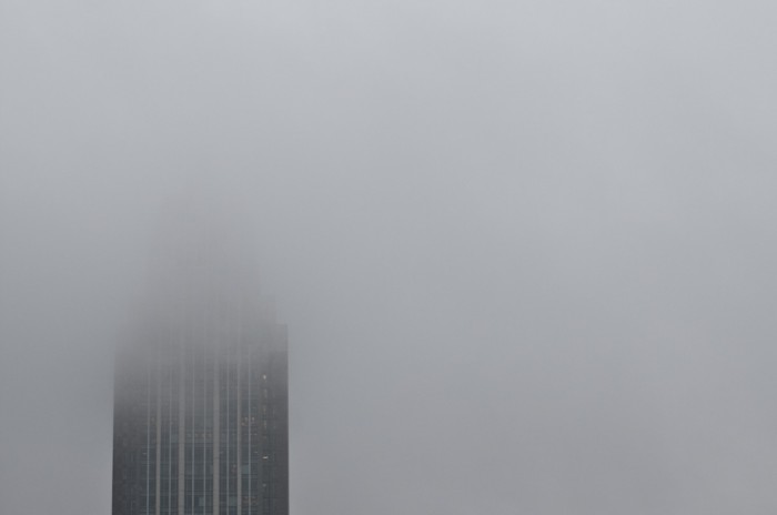 The RSA Tower rises into the clouds of a rainy day in downtown Mobile, Ala., Tuesday, Dec. 1, 2009.