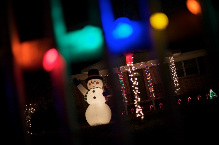 A snowman waves to passersby from a home in West Mobile, Alabama, Monday, Dec. 7, 2009.