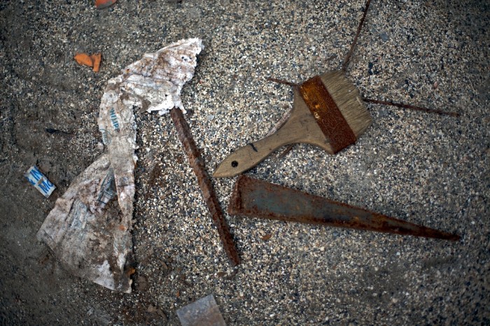 Items lie in a parking lot at a business in downtown Mobile, Ala., Monday, Jan. 4, 2010.