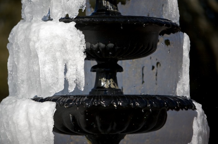 Ice melts off of a fountain on Dauphin Street in Mobile, Ala., Tuesday morning, Jan. 12, 2010.