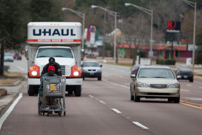 Walking down a busy road with no sidewalks