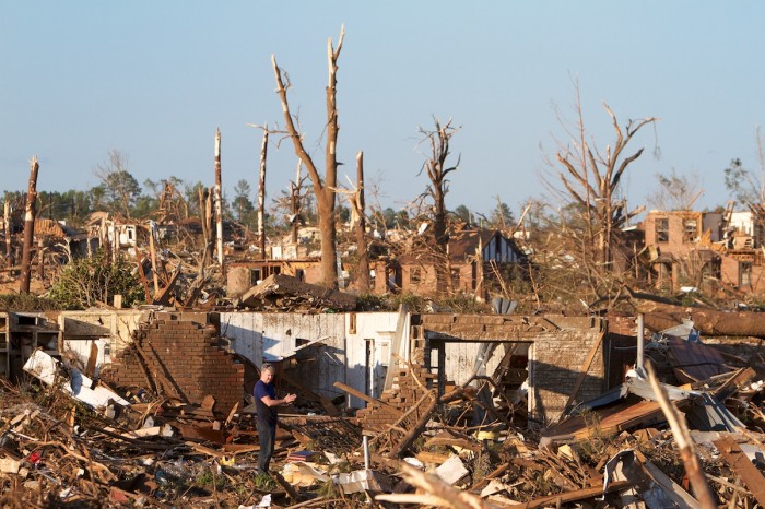 Buildings, houses and trees lie scattered near Forest Lake in Tuscaloosa, Ala., Thursday evening, April 28, 2011, after a tornado swept through the night before. More than 100 people were killed in Alabama from the storms.