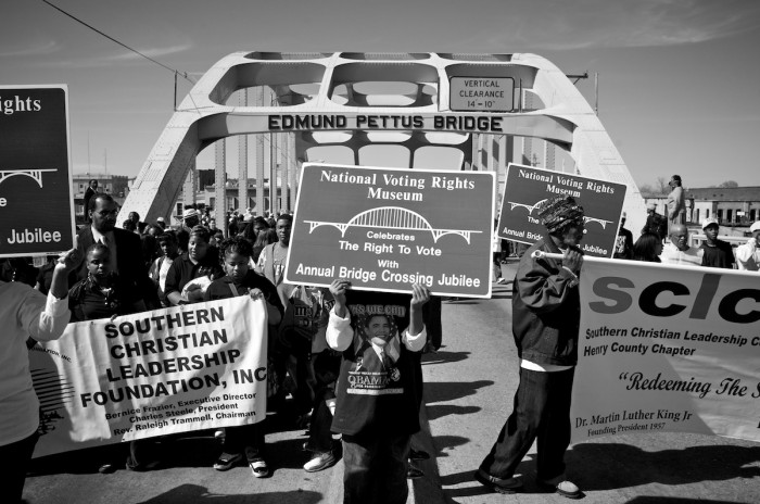 Marchers participate in the annual bridge-crossing jubilee in Selma, Ala., Sunday, March 9, 2008, commemorating the Bloody Sunday events of 1965 in which civil rights activists were attacked at the Edmund Pettus Bridge on their way to the State Capitol in Montgomery.