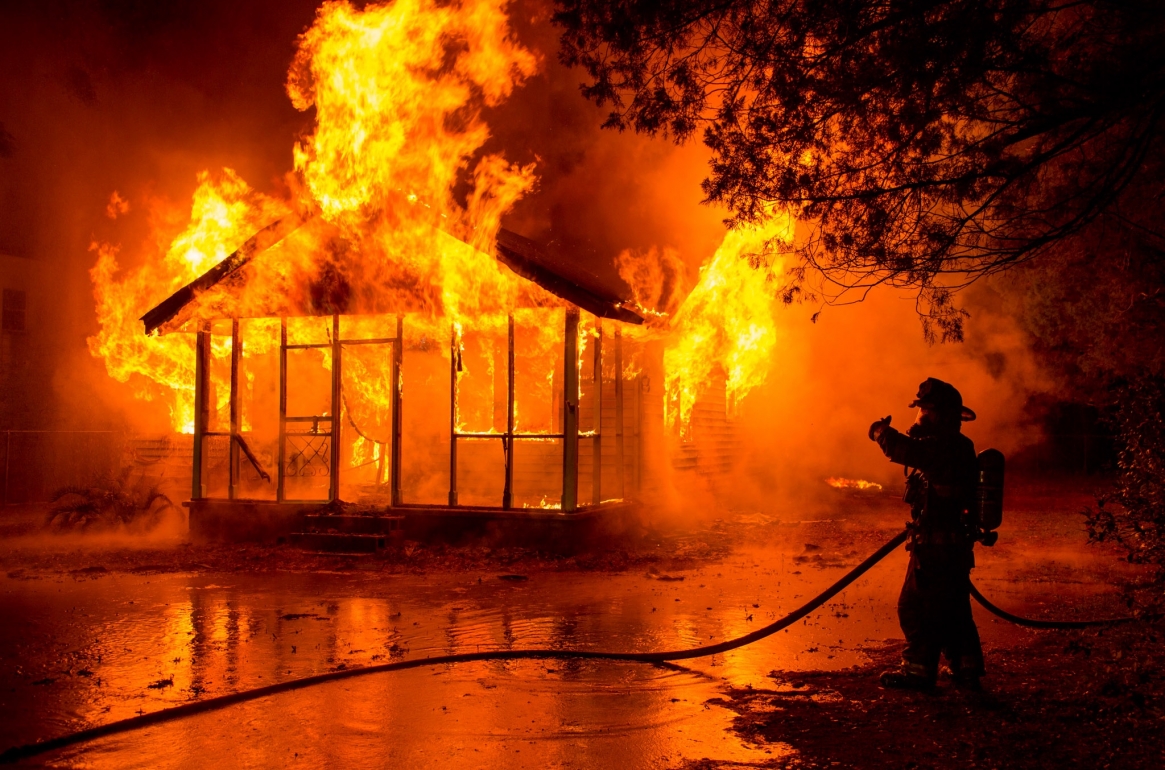 A house burns during a fire department training exercise